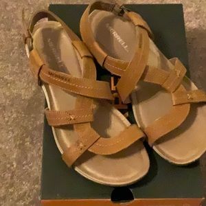 Merrell flat sandals size 7 dark tan color.   Worn only a handful of times